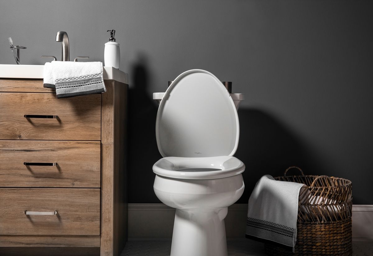 Asiento para sanitario TruComfort™ alargado color blanco de plástico con Bisagras Ajustables, Permajuste™, Cierre Lento, FlexZones™ y ErgoCurve™